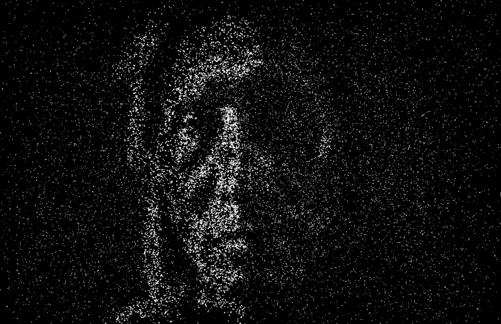 Safe Place: a face half lit, half lost in shadow